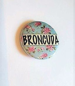 BRONCUDA Flower PIN BUTTON black font on blue and pink flowers 1.5"