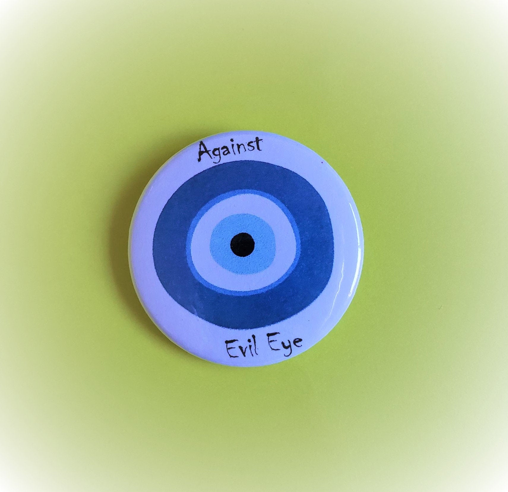 AGAINST EVIL EYE PIn Button 1.5"