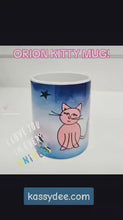 Load and play video in Gallery viewer, ORION KITTY Galaxy Mug 12 OZs
