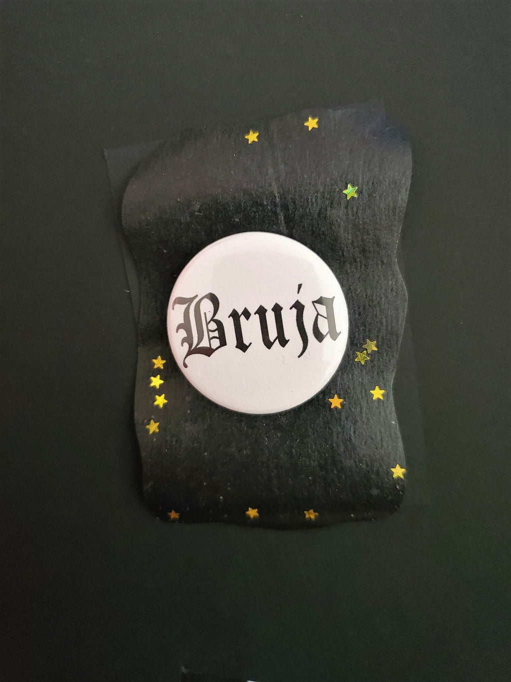 BRUJA PIN BUTTON black font on white 1.5"