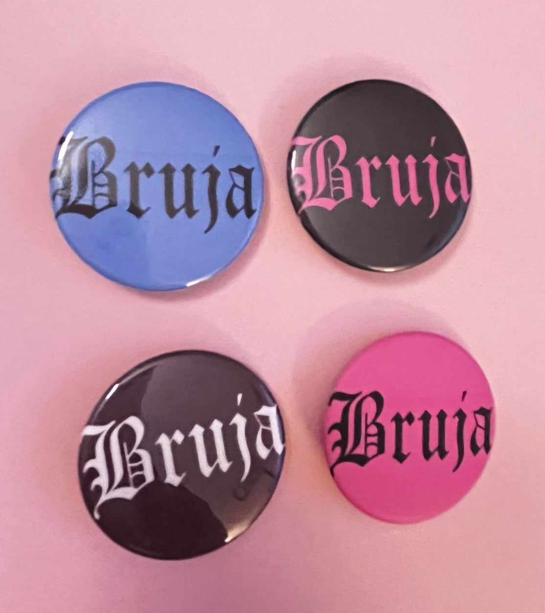 BRUJA PIN BUTTON black font on white 1.5"