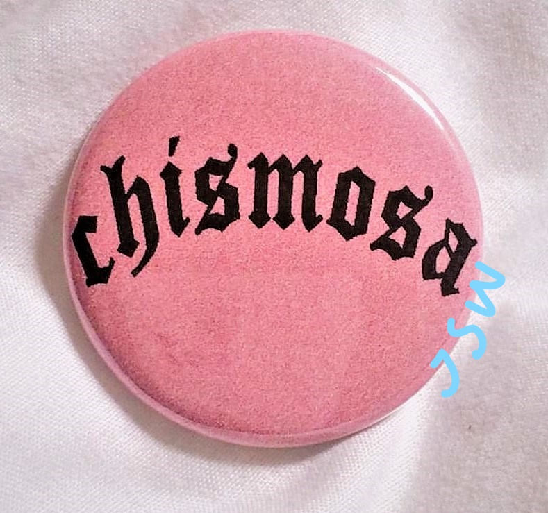 CHISMOSA PIN BUTTON black font on pink 1.5"
